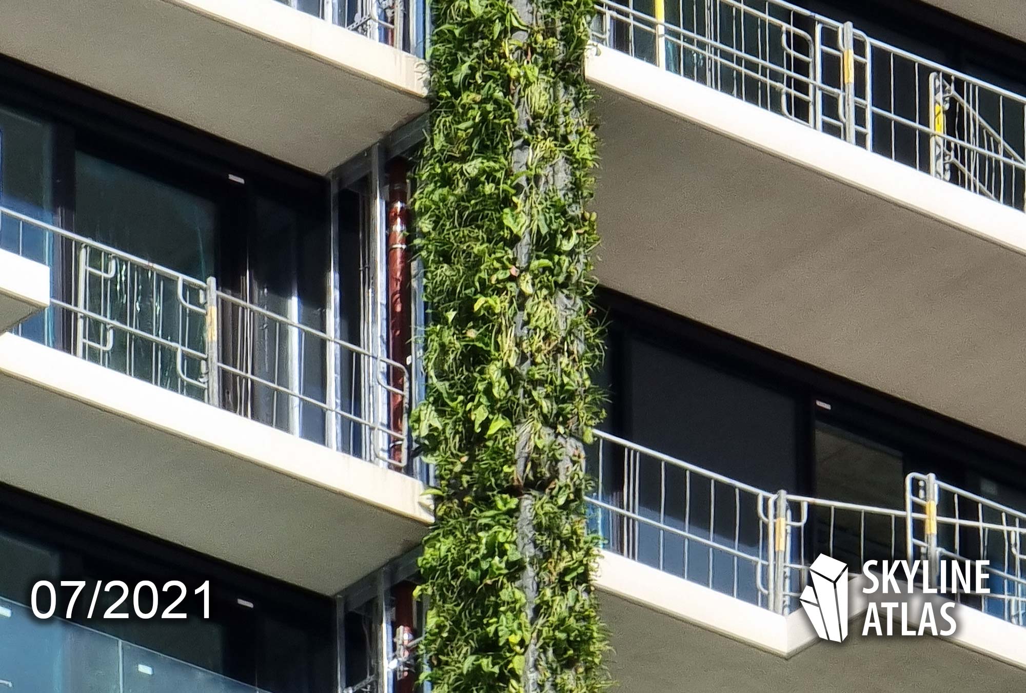 Green highrise facade in Frankfurt, Europe - green building facade - plants - July 2021