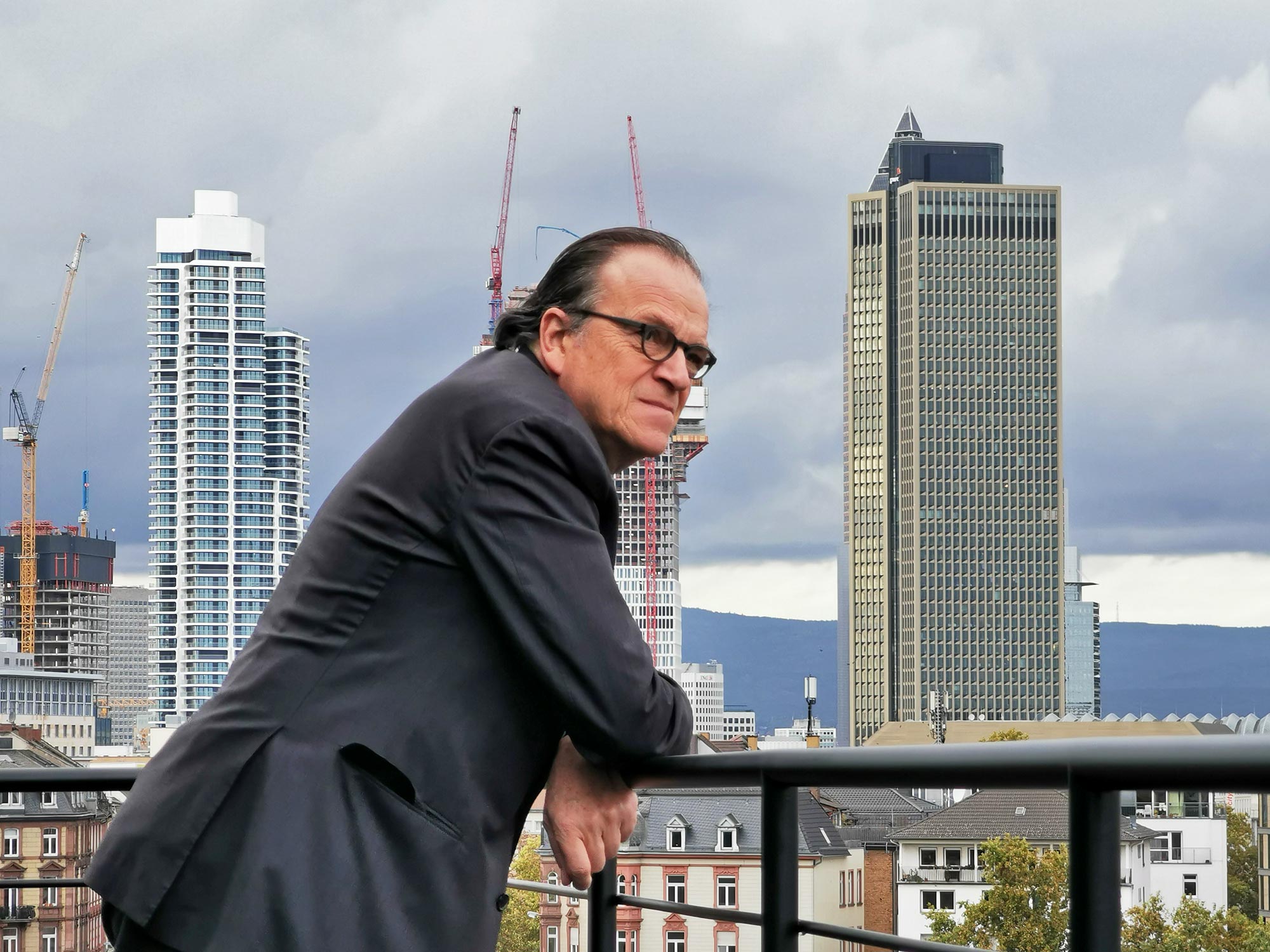 Architect and City Planner Christoph Maeckler in Frankfurt in front of skyscrapers